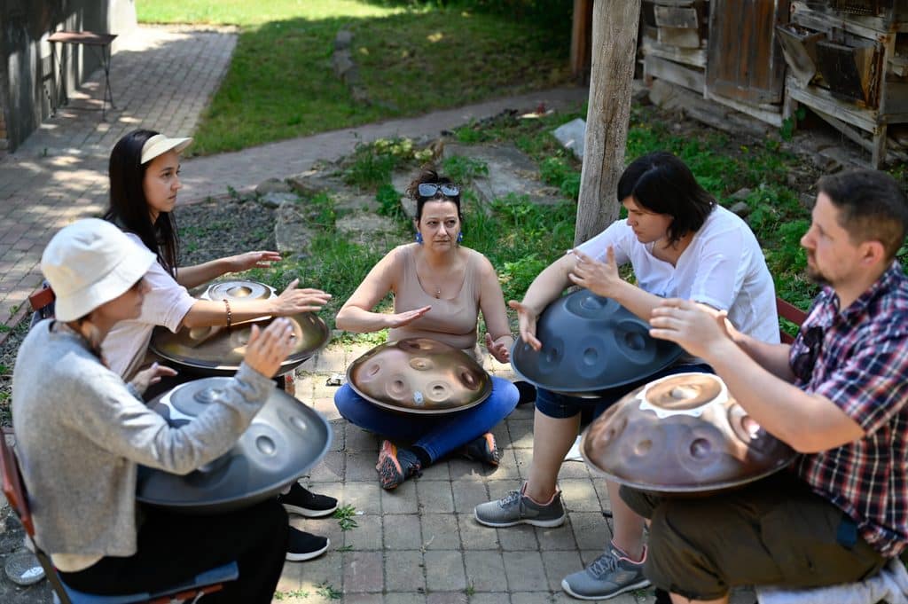 MAG handpans being played including a Hijaz scale one